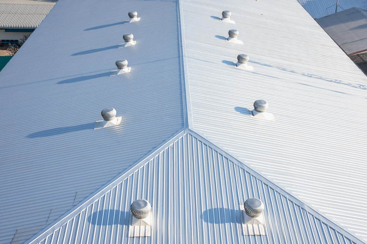 White metal commercial roof with turbine vents