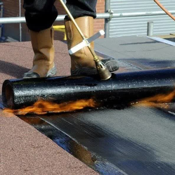 Torch-applied modified bitumen roll on a flat roof