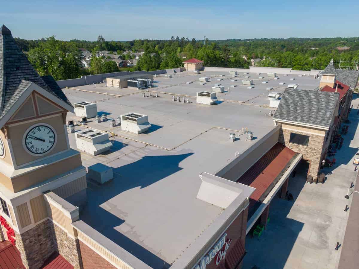 Light commercial roofing on a large building